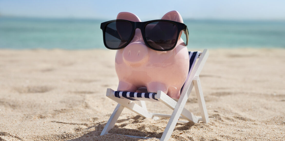 Piggy Bank On Deckchair With Sunglasses